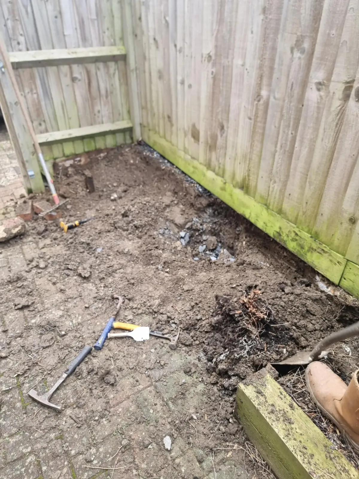 Before: old, worn patio prior to renovation